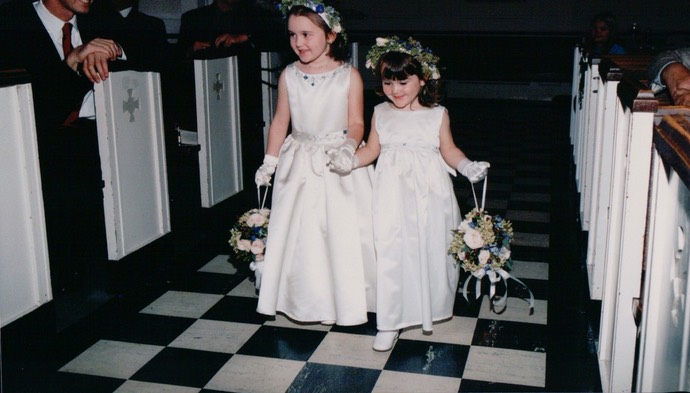 Emily and Courtney down Aisle
