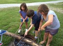 Kids Starting a Camp Fire
